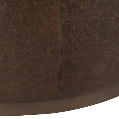 Clair Leather Round Coffee Table by Classic Home in brown, brass. Made from top grain leather in a unique style.