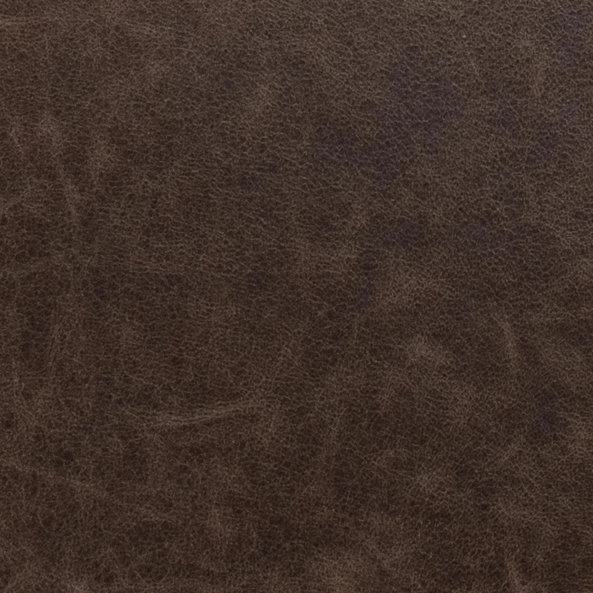 Clair Leather Round Coffee Table by Classic Home in brown, brass. Made from top grain leather in a unique style.