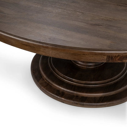 Brookside Round Mango Wood Dinning Table by Classic Home in cocoa brown. Made from mango wood in a traditional style.