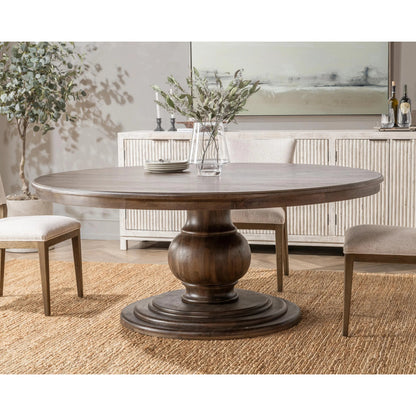Brookside Round Mango Wood Dinning Table by Classic Home in cocoa brown. Made from mango wood in a traditional style.
