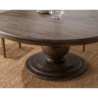 Brookside Round Mango Wood Dinning Table by Classic Home in cocoa brown. Made from mango wood in a traditional style.