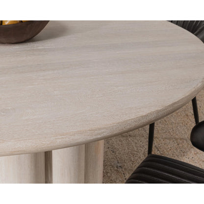 Beau Mango Wood Round Dining Table by Kosas Home in matte natural. Made from mango wood in a transitional style.