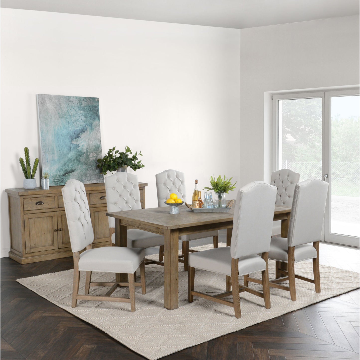 007 SR-897692 | Lifestyle | Driftwood Extension Dining Table by Kosas Home in desert gray. Made from reclaimed pine wood in a rustic style.