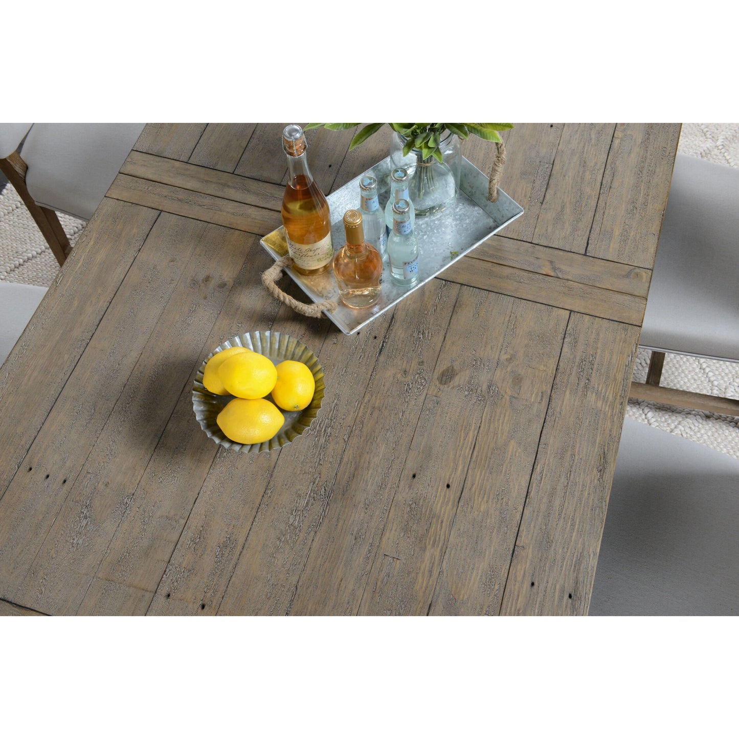 006 SR-897692 | Closeup | Driftwood Extension Dining Table by Kosas Home in desert gray. Made from reclaimed pine wood in a rustic style.