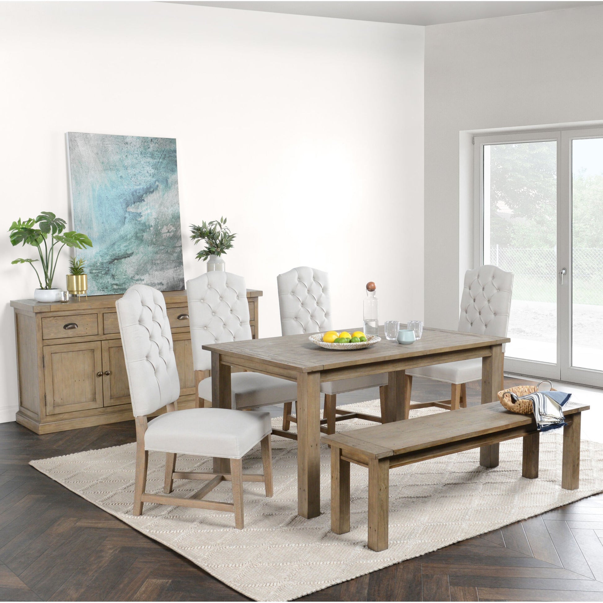 Driftwood Dining Table by Kosas Home in desert gray. Made from reclaimed pine wood in a rustic style.