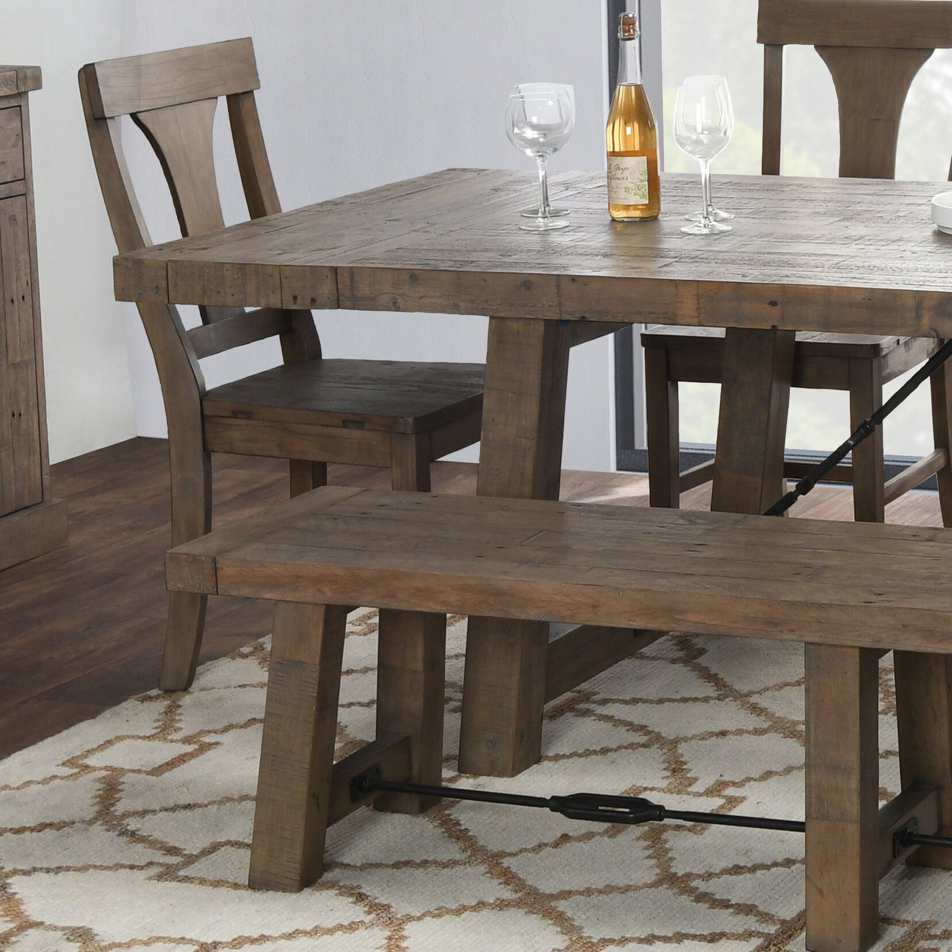 Tuscany Extension Dining Table by Kosas Home in desert gray. Made from reclaimed pine wood in a rustic style.