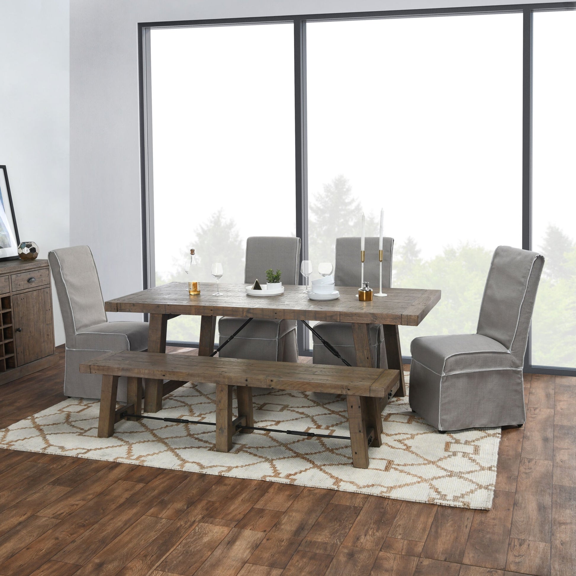 Tuscany Extension Dining Table by Kosas Home in desert gray. Made from reclaimed pine wood in a rustic style.