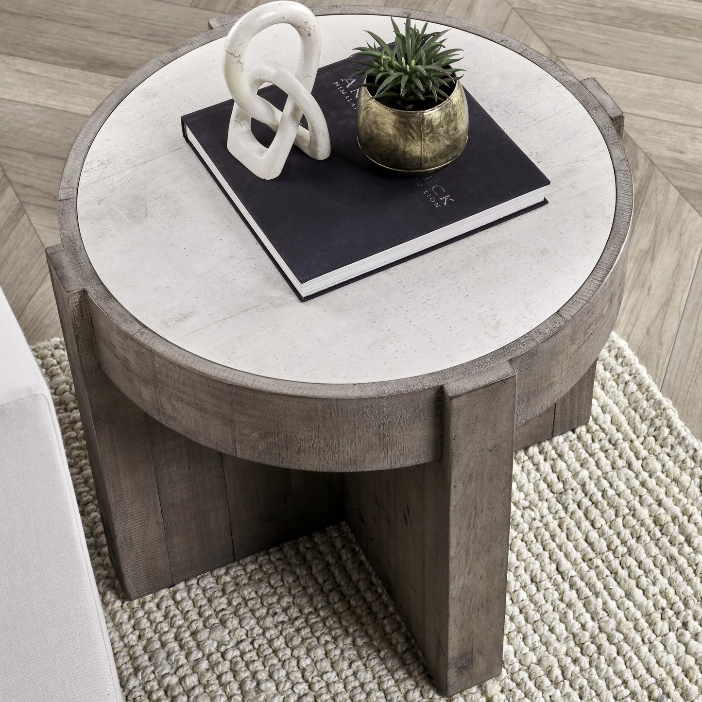 007 SI-2160262 | Lifestyle | Sonoma Round Reclaimed Pine End Table by Classic Home in corsican grey & antique white top. Made from reclaimed pine, concrete laminate top in a modern style.