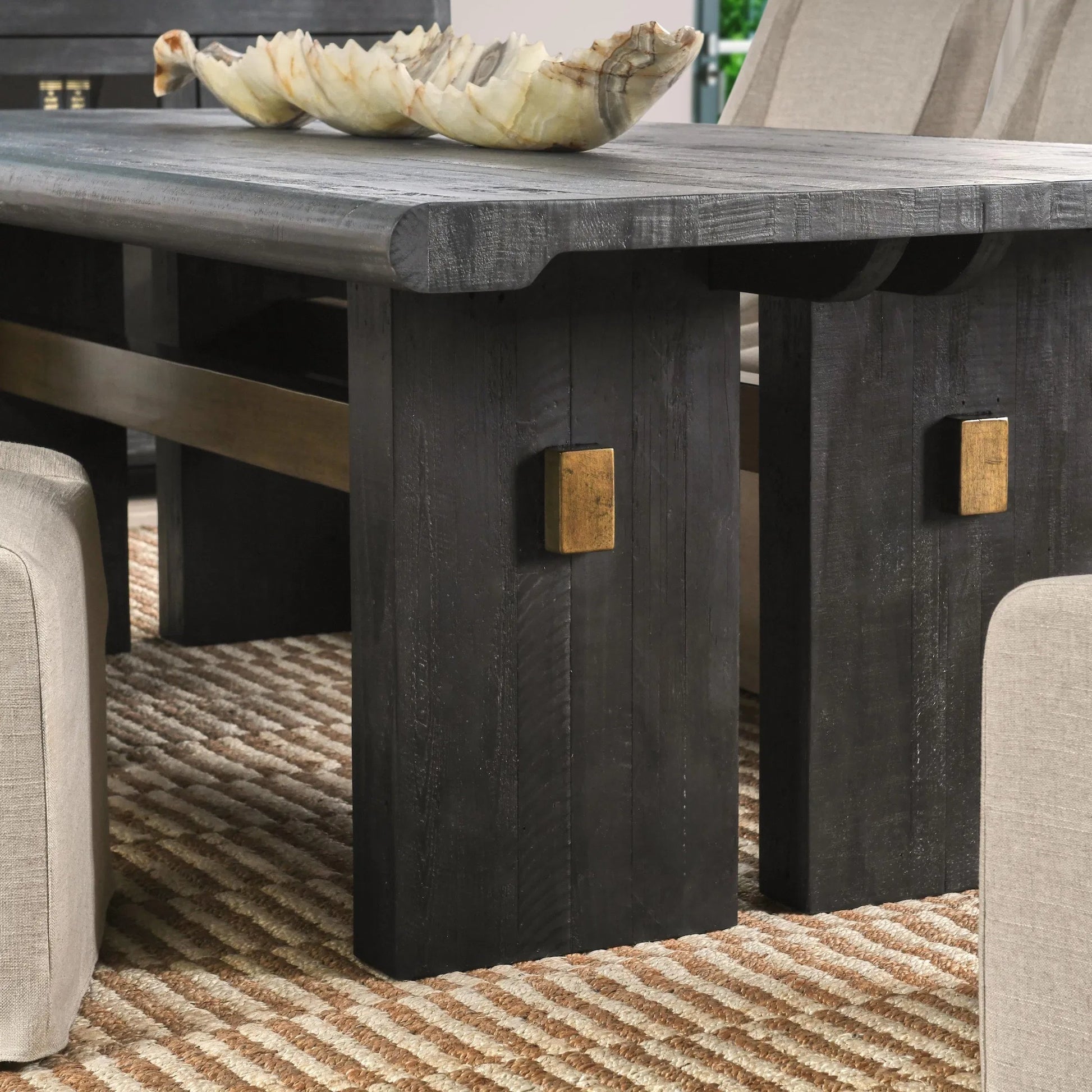 Larson Dining Table by Classic Home in black, classic brass. Made from pine wood in a modern style.