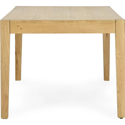 Beechgrove Dining Table by Kosas Home in natural brown. Made from oak wood in a modern style.