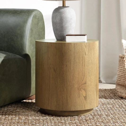 Layne Round End Table by Classic Home. Made from oak veneer in a modern style.