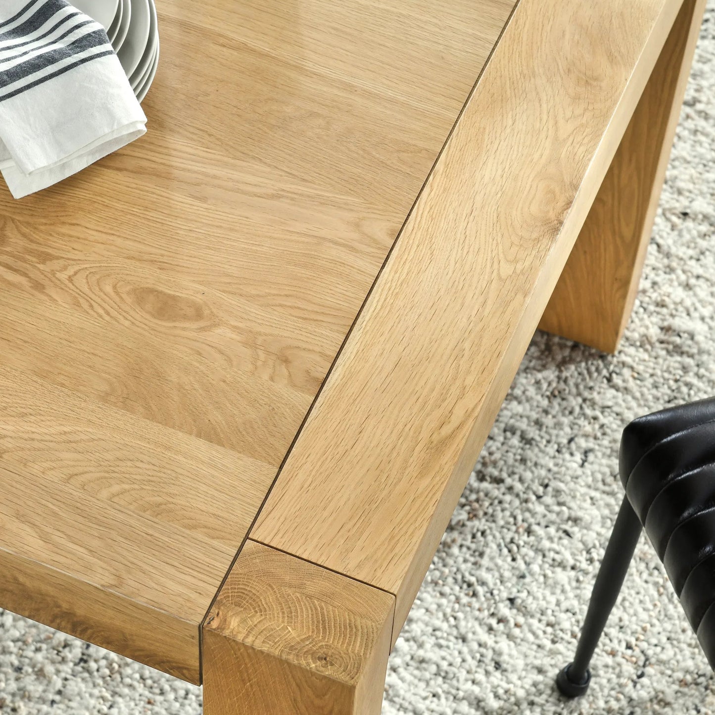 005 SI-2453392 | Closeup | Parsons Dining Table by Kosas Home in matte natural brown. Made from oak in a transitional style.
