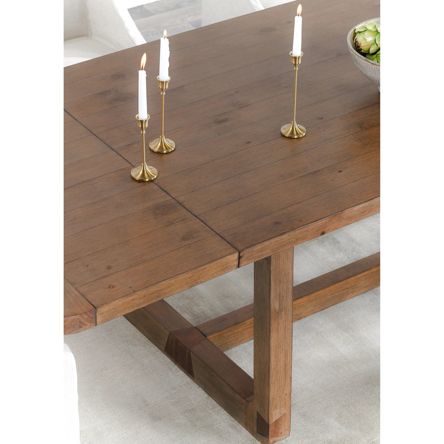 003 SI-2238833 | Closeup | Lyra Extendable Dining Table by Classic Home in brown. Made from pine wood in a transitional style.