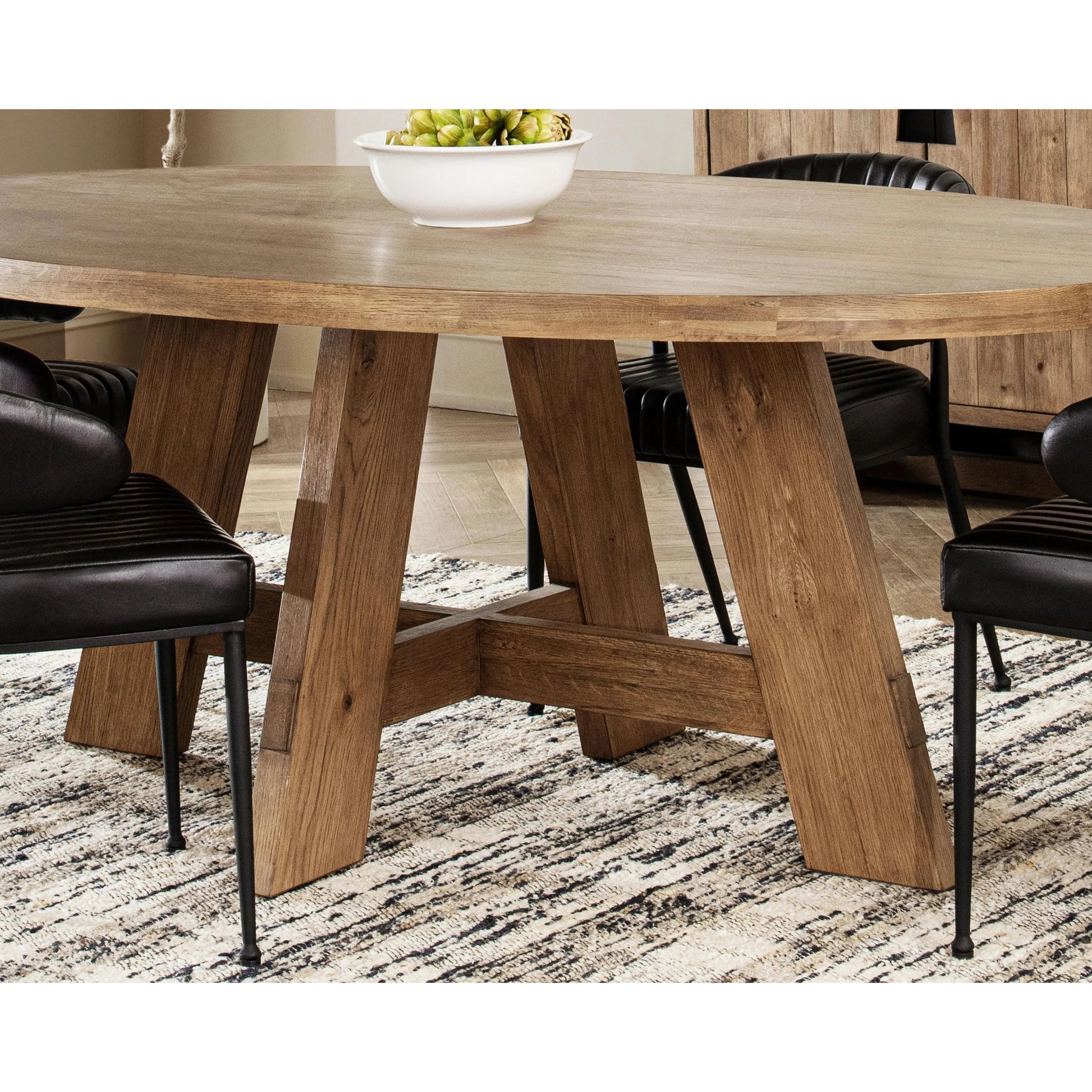 Crescent Oval Reclaimed Oak Wood Dining Table by Kosas Home in natural. Made from reclaimed oak veneer in a unique style.