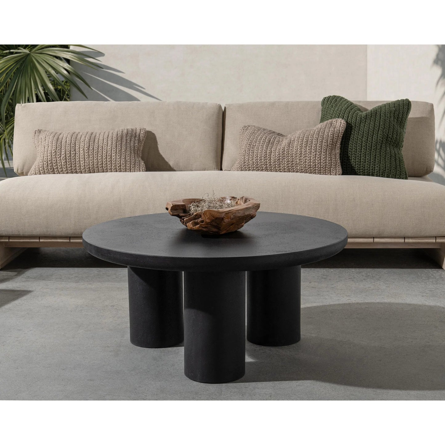 008 SI-2353718 | Lifestyle | Anzio Outdoor Coffee Table by Classic Home in black. Made from glass fiber reinforced concrete in a modern style.