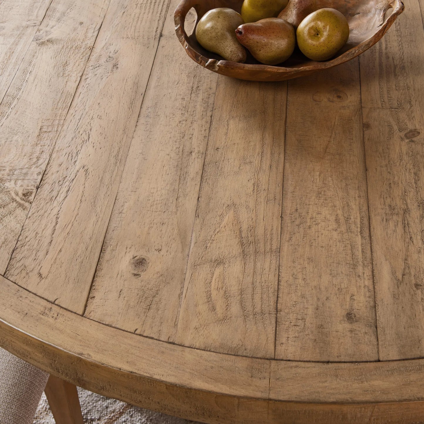 006 SI-2353723 | Closeup | Allegra Reclaimed Circular Pine Wood Dining Table by Kosas Home in natural. Made from reclaimed pine in a transitional style.