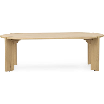 Kering Oak Wood Oval Coffee Table by Kosas Home in natural. Made from solid oak wood in a transitional style.