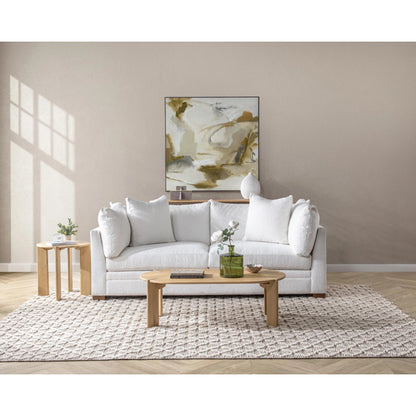 Kering Oak Wood Oval Coffee Table by Kosas Home in natural. Made from solid oak wood in a unique style.