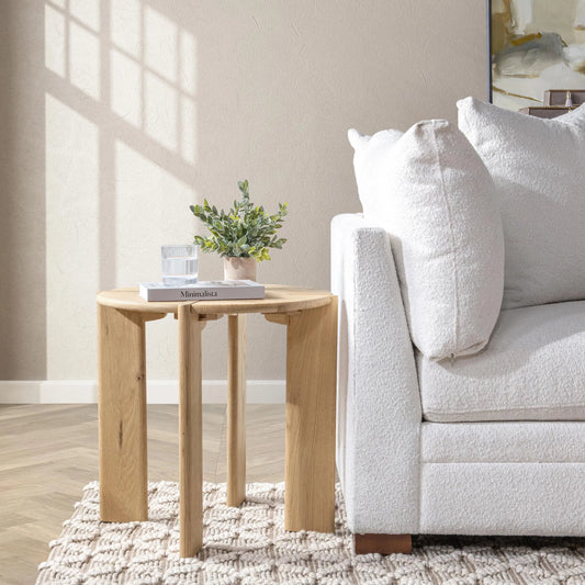 Kering Oak Wood Round End Table by Kosas Home in natural. Made from solid oak wood in a transitional style.