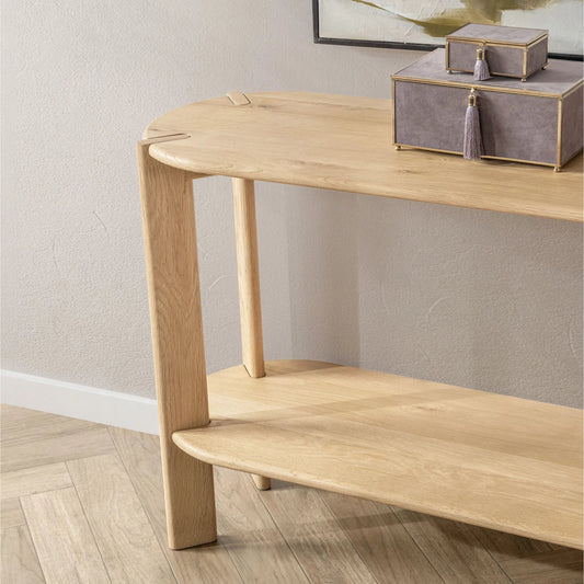 Kering Oak Wood Oval Console Table by Kosas Home in natural. Made from solid oak wood in a transitional style.