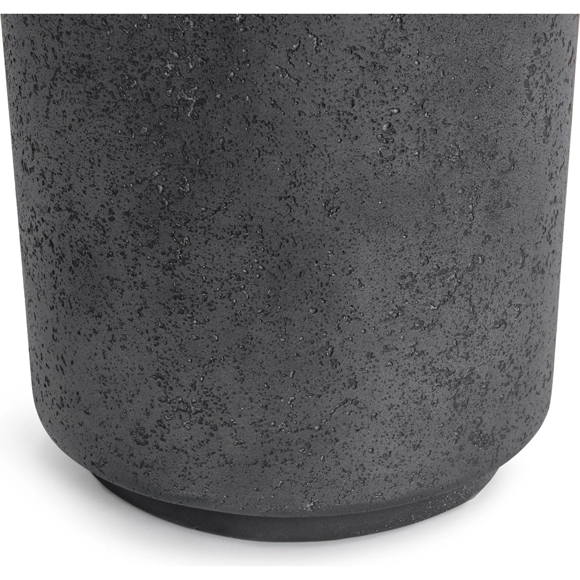 Darsa Outdoor Accent Table by Classic Home in dark gray. Made from glass fiber reinforced concrete in a unique style.