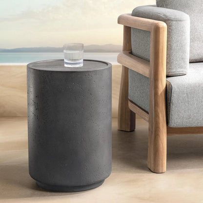 Darsa Outdoor Accent Table by Classic Home in dark gray. Made from glass fiber reinforced concrete in a unique style.