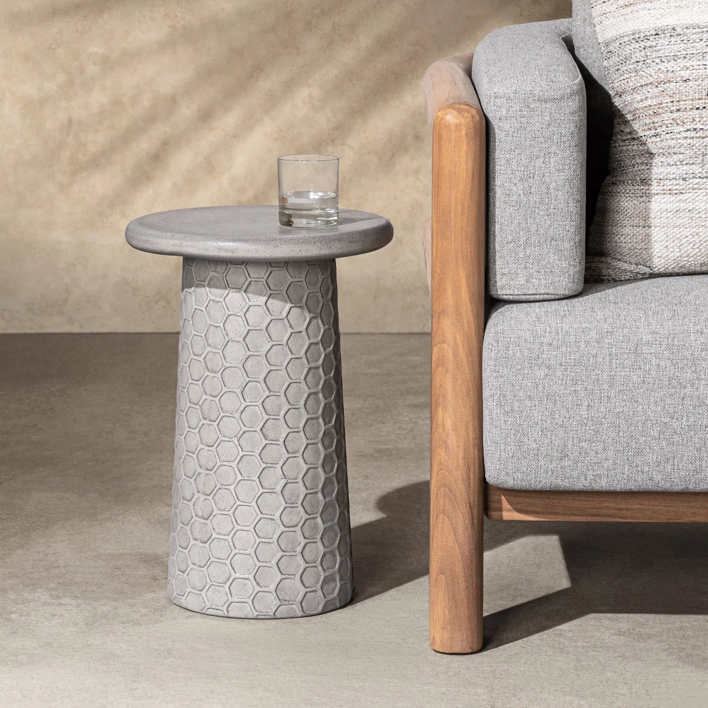 006 SI-2533205 | Lifestyle | Delaine Outdoor Concrete Accent Table by Classic Home in light gray. Made from glass fiber reinforced concrete in a unique style.