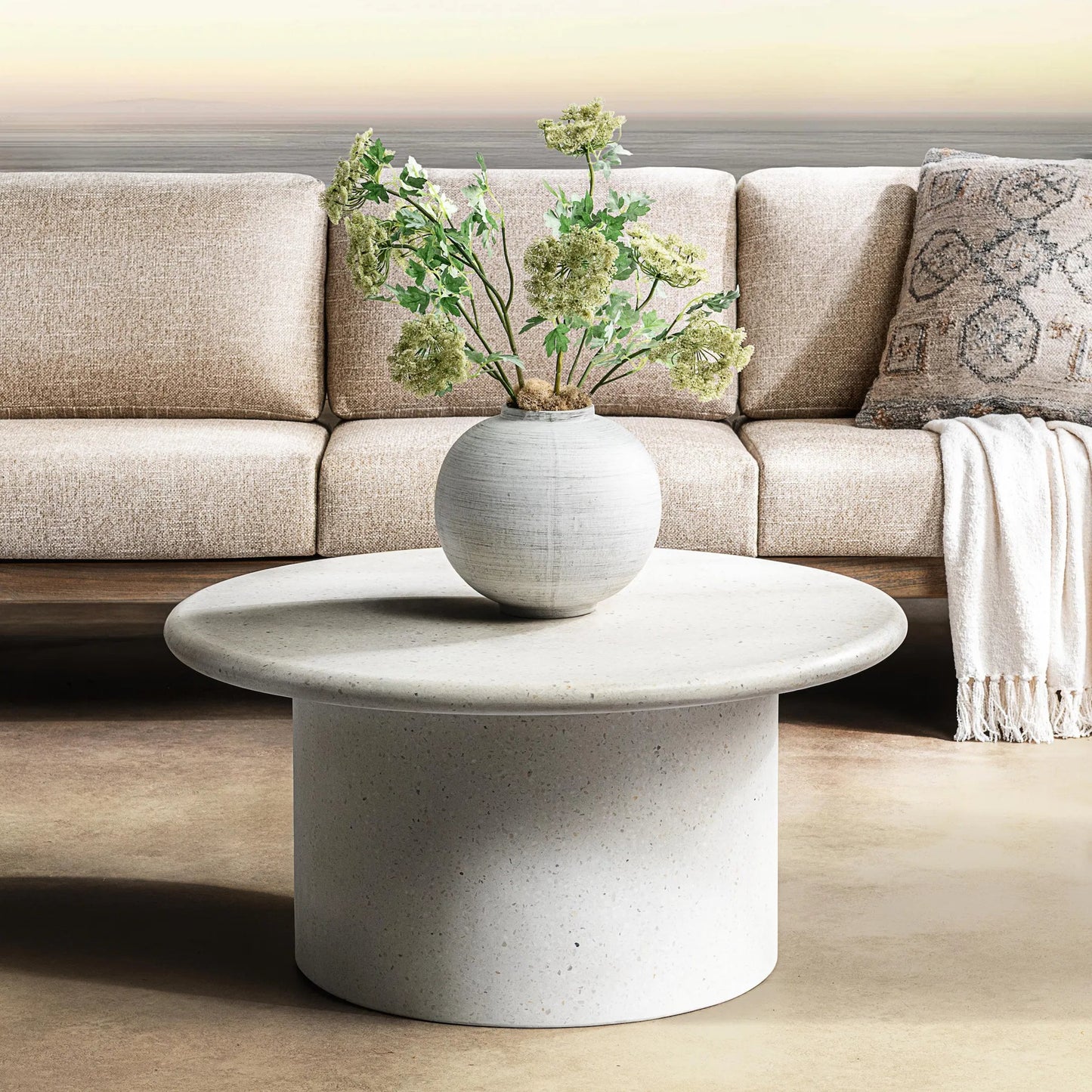 005 SI-2533210 | Lifestyle | Nysa Outdoor Concrete Coffee Table by Classic Home in white. Made from glass fiber reinforced concrete in a unique style.