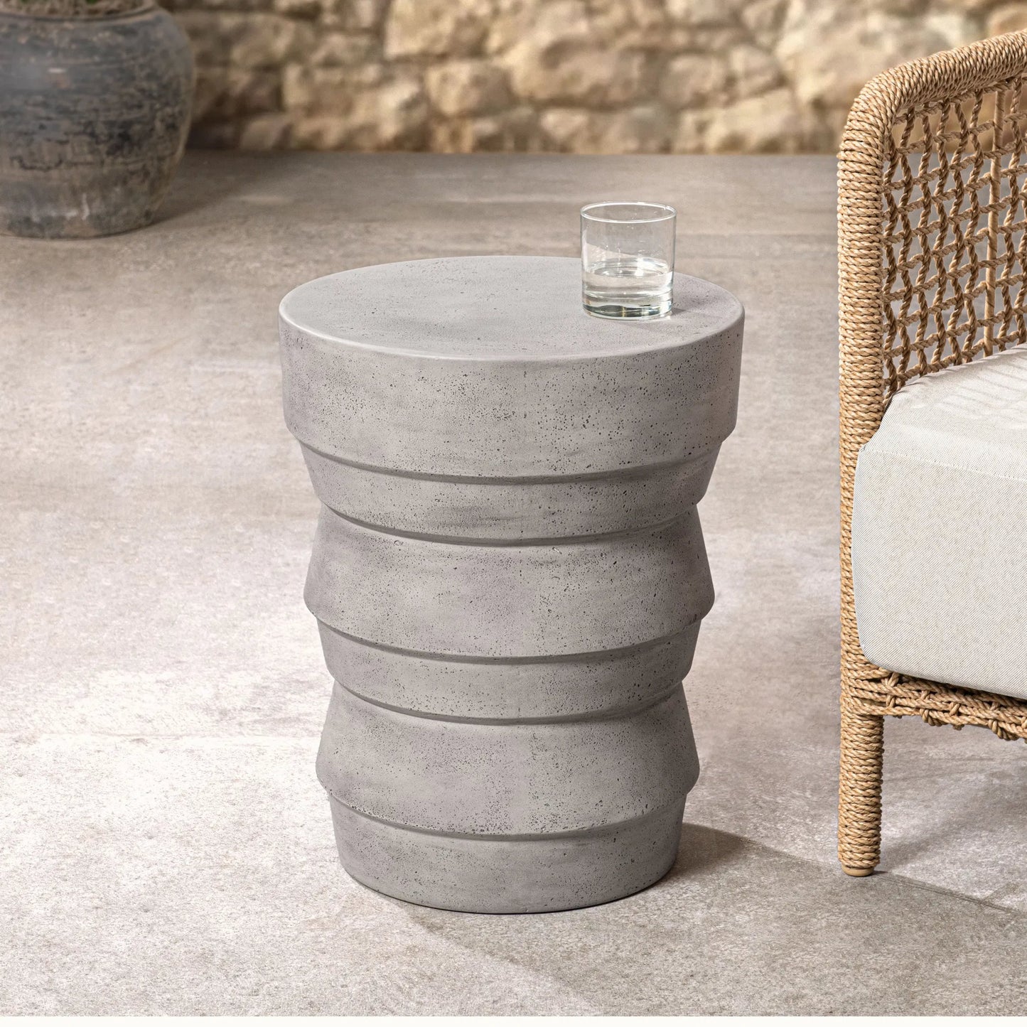 006 SI-2537792 | Lifestyle | Anora Outdoor Accent table by Classic Home in light gray. Made from glass fiber reinforced concrete in a unique style.