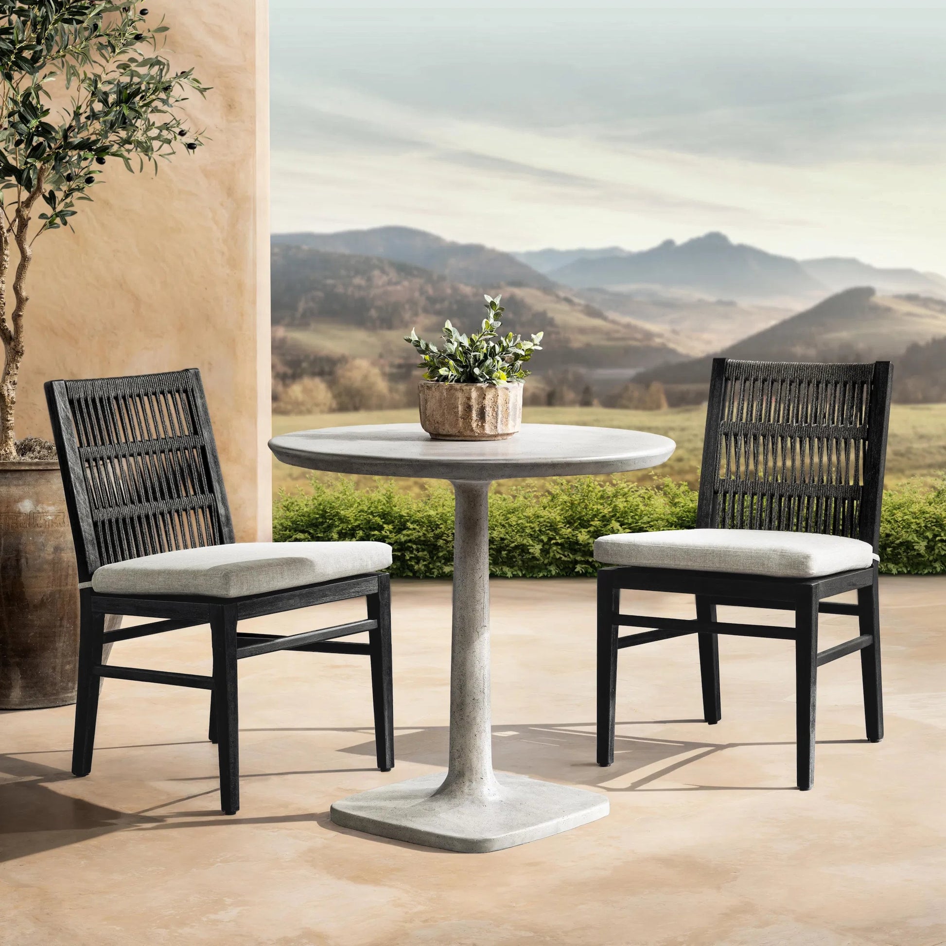Paulina Outdoor Bistro Table by Classic Home in light gray. Made from glass fiber reinforced concrete in a unique style.