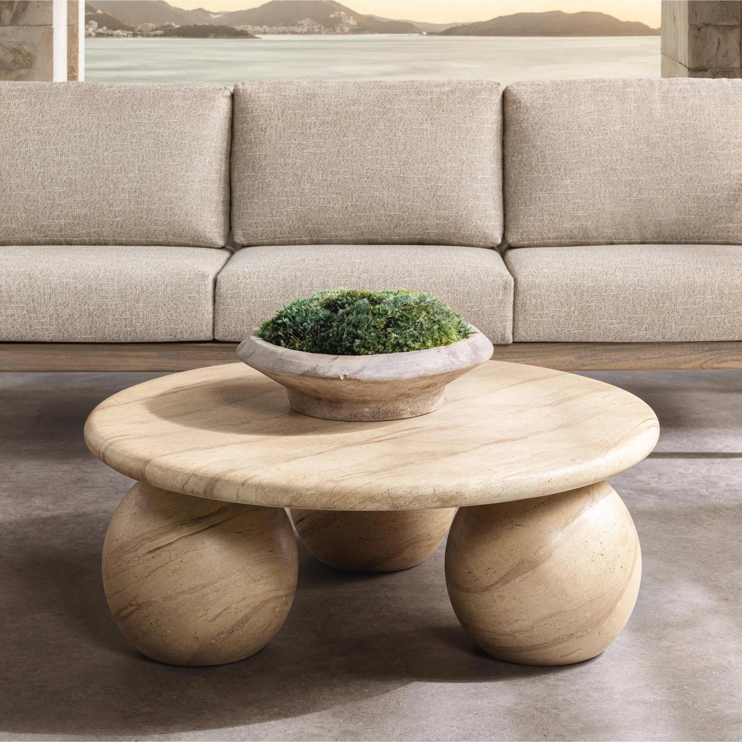 006 SI-2537796 | Lifestyle | Elaria Outdoor Coffee Table by Classic Home in beige. Made from glass fiber reinforced concrete in a unique style.