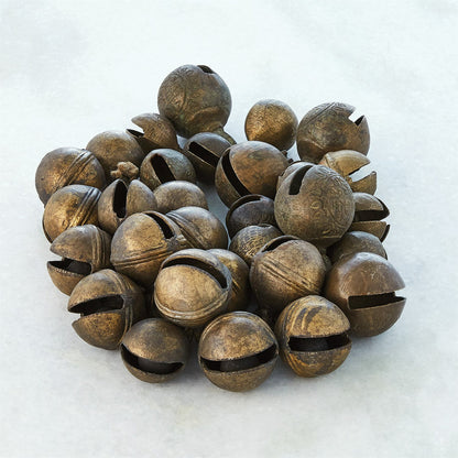 Brass Bell Cluster by Global Views. Made from brass, jute in a rustic style.