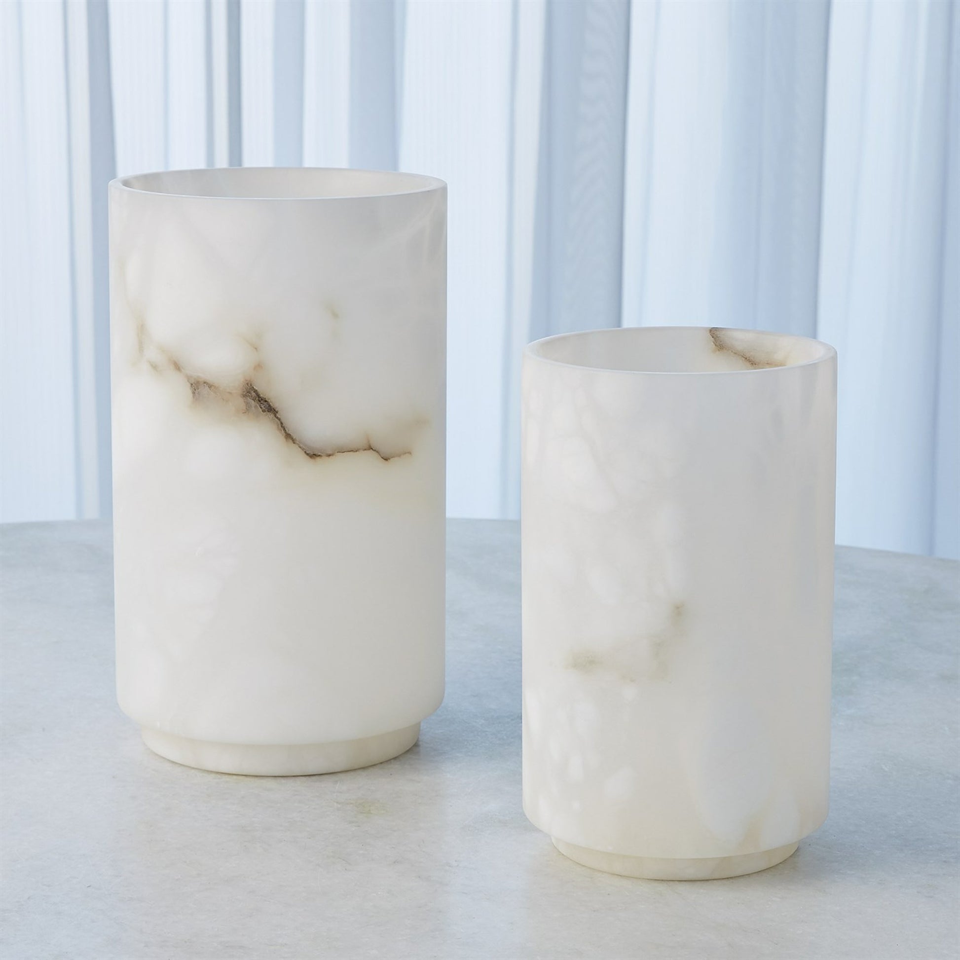 Alabaster Cylinder Vase by Global Views in white. Made from alabaster in a modern style.