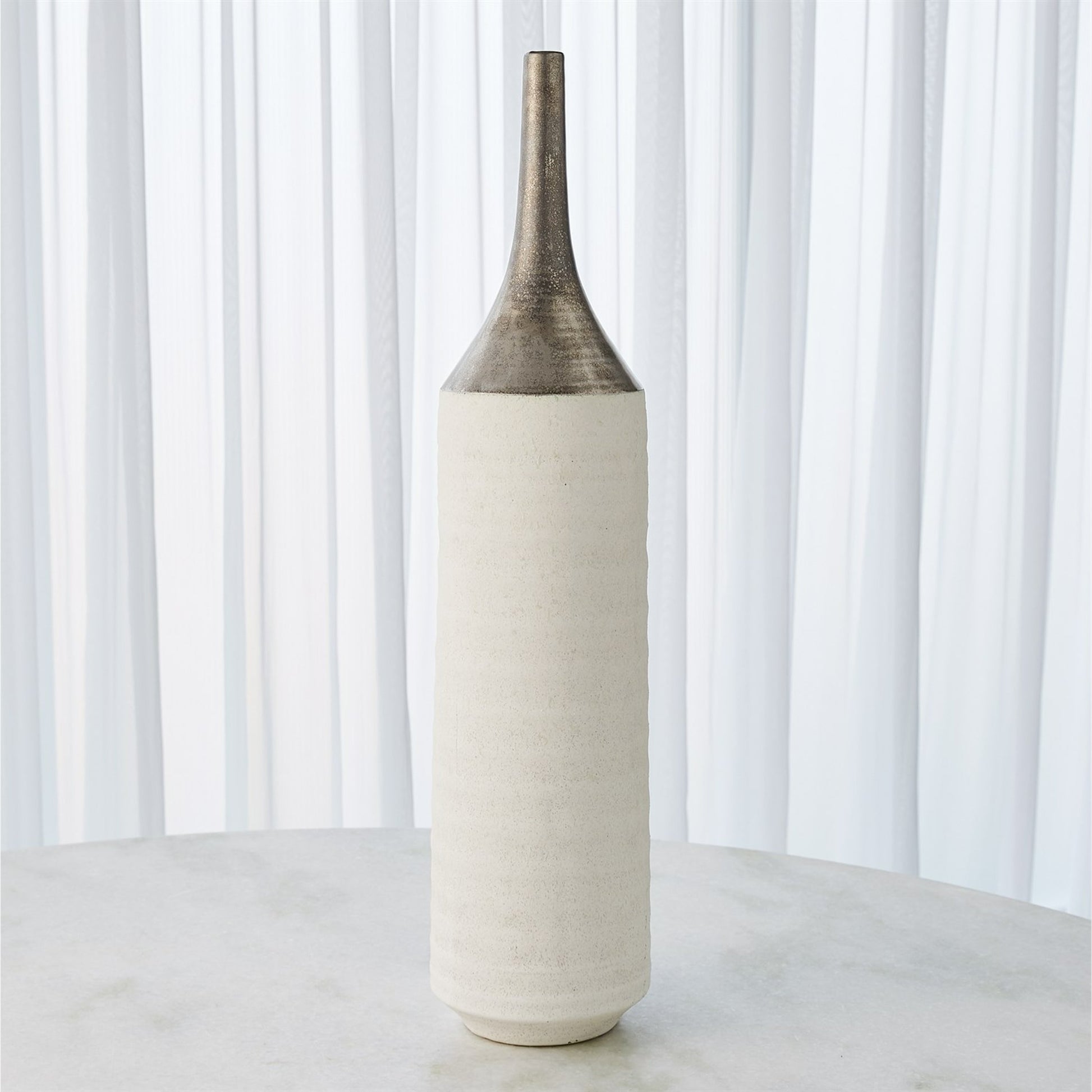 Two Toned Vase by Global Views in gold. Made from ceramic in a eclectic & global style.