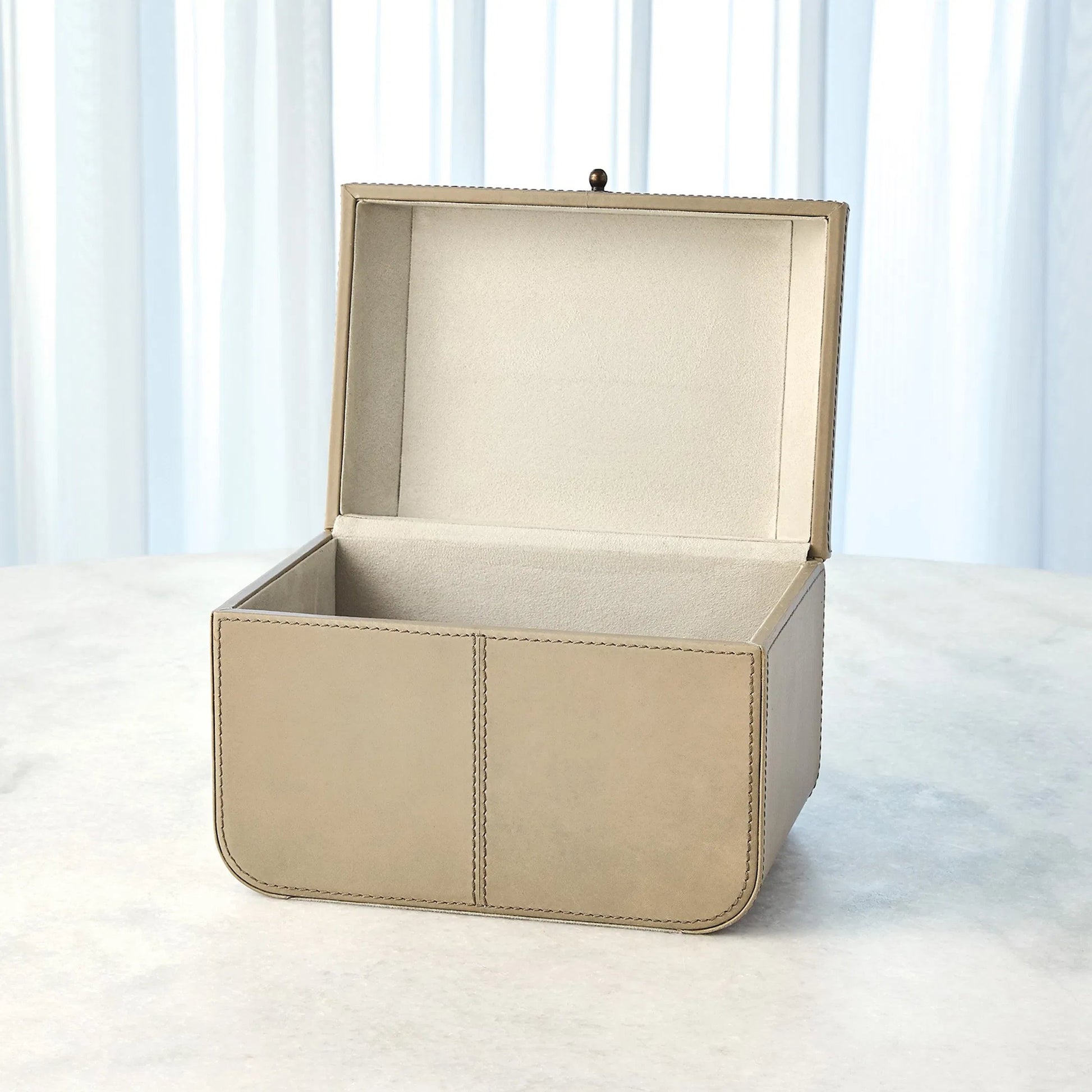 Curved Corner Box by Global Views. Made from mdf, leather, polysuede lining in a eclectic & global style.