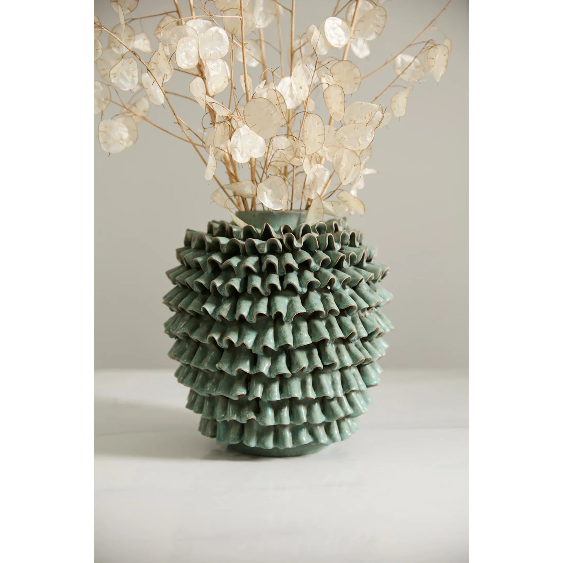 En Pointe Vase by Accent Decor in green. Made from ceramic in a unique style.