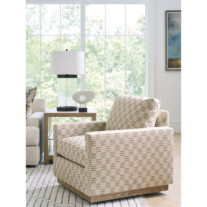 Meadow View Swivel Chair by Barclay Butera in tan. Made from mahogany, fabric in a transitional style.