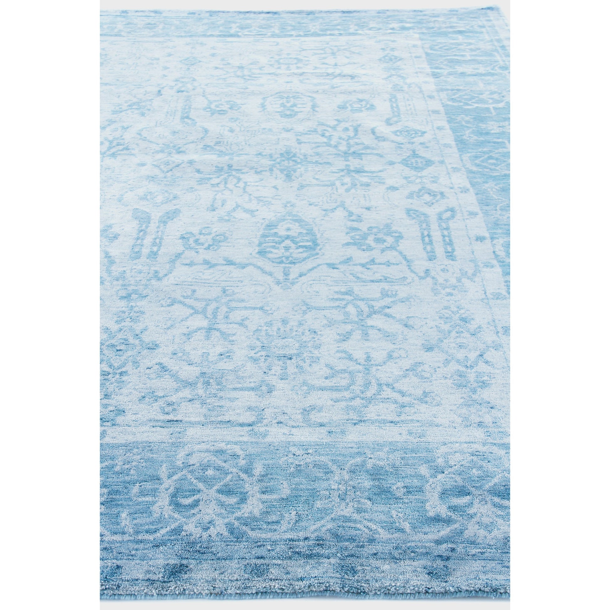 Antique'd Silk Rug by Exquisite Rugs. Made from bamboo silk in a unique style.
