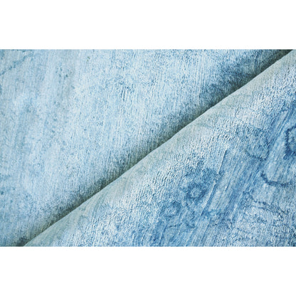 Antique'd Silk Rug by Exquisite Rugs. Made from bamboo silk in a unique style.