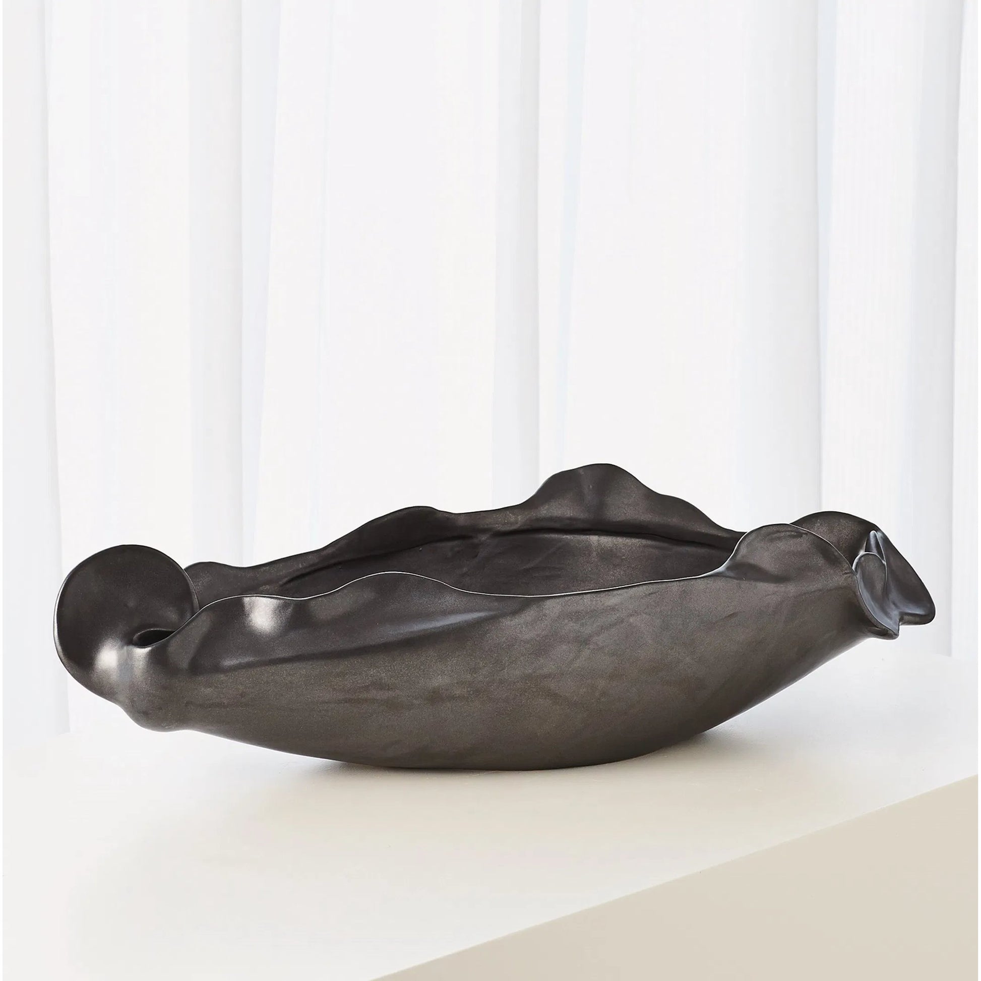 Free Form Organic Bowl by Global Views. Made from ceramic in a modern style.