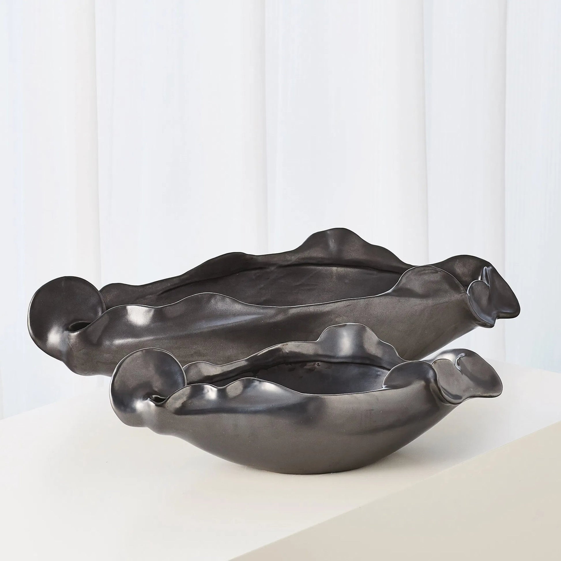 Free Form Organic Bowl by Global Views. Made from ceramic in a modern style.
