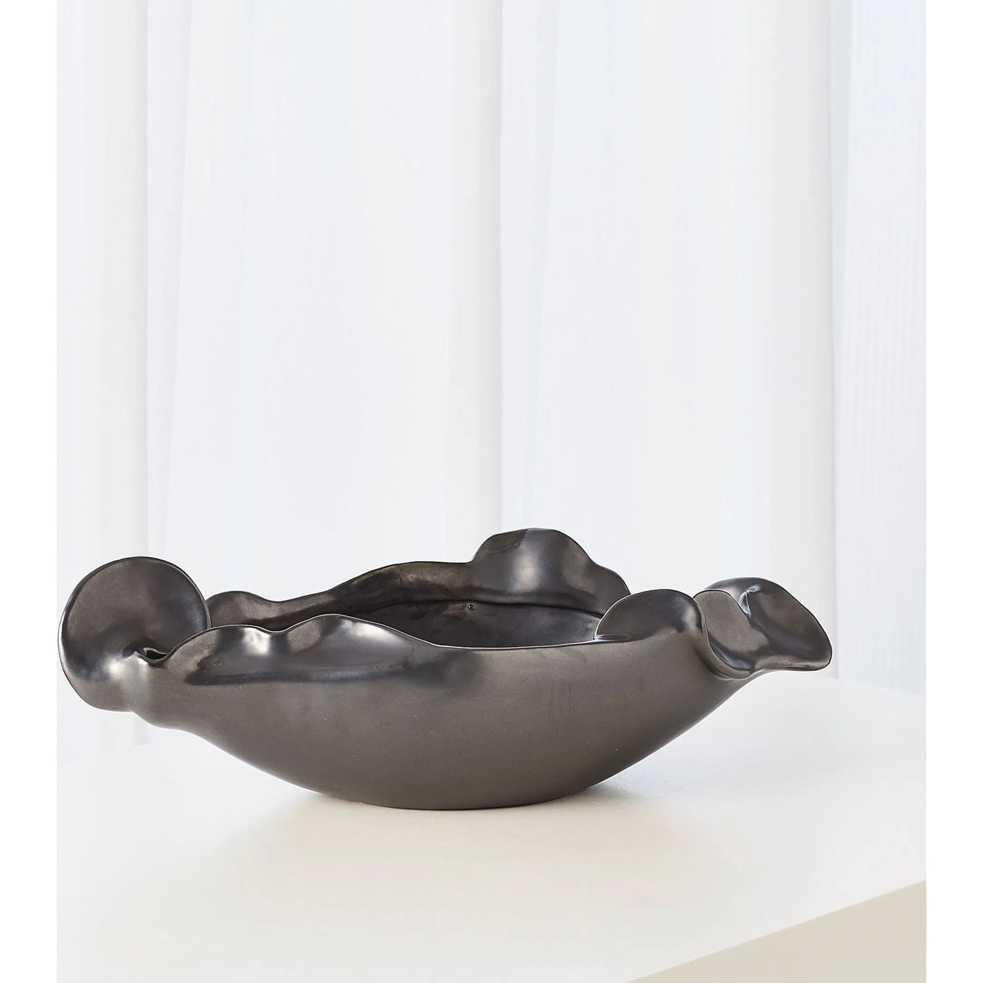 Free Form Organic Bowl by Global Views. Made from ceramic in a modern style.