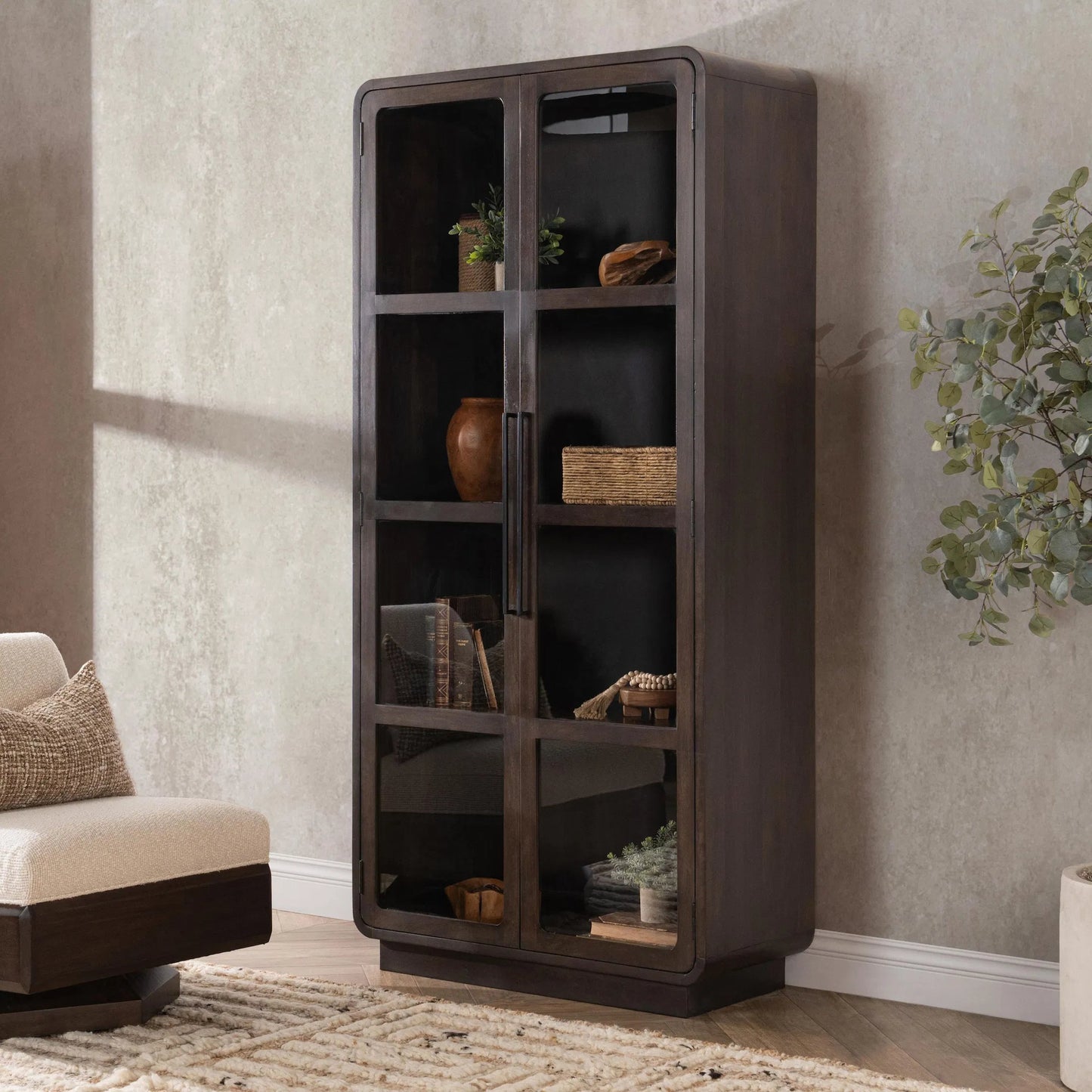 020 SI-2388527 | Lifestyle | Rogers Mango Wood Curio Cabinet by Classic Home in brown. Made from mango wood in a modern style.