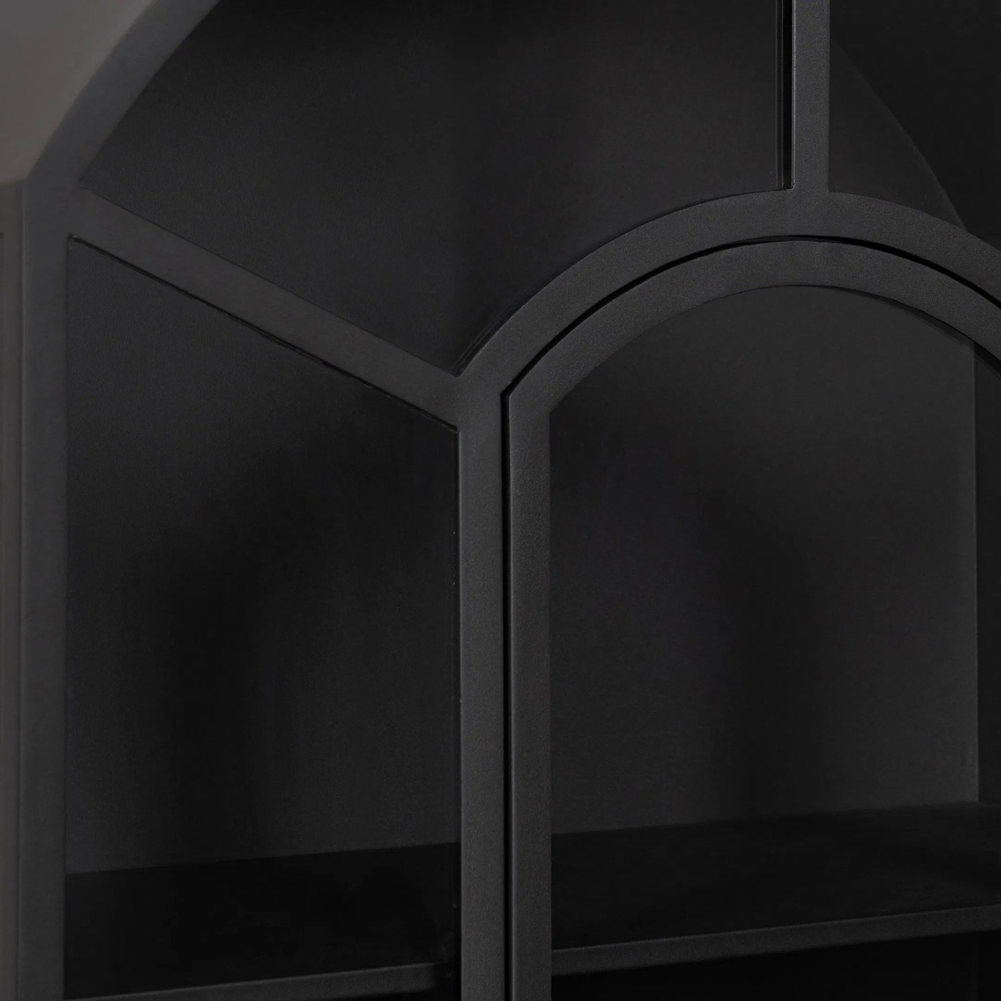 Lillo Metal Curio Cabinet by Classic Home in black. Made from metal in a modern style.