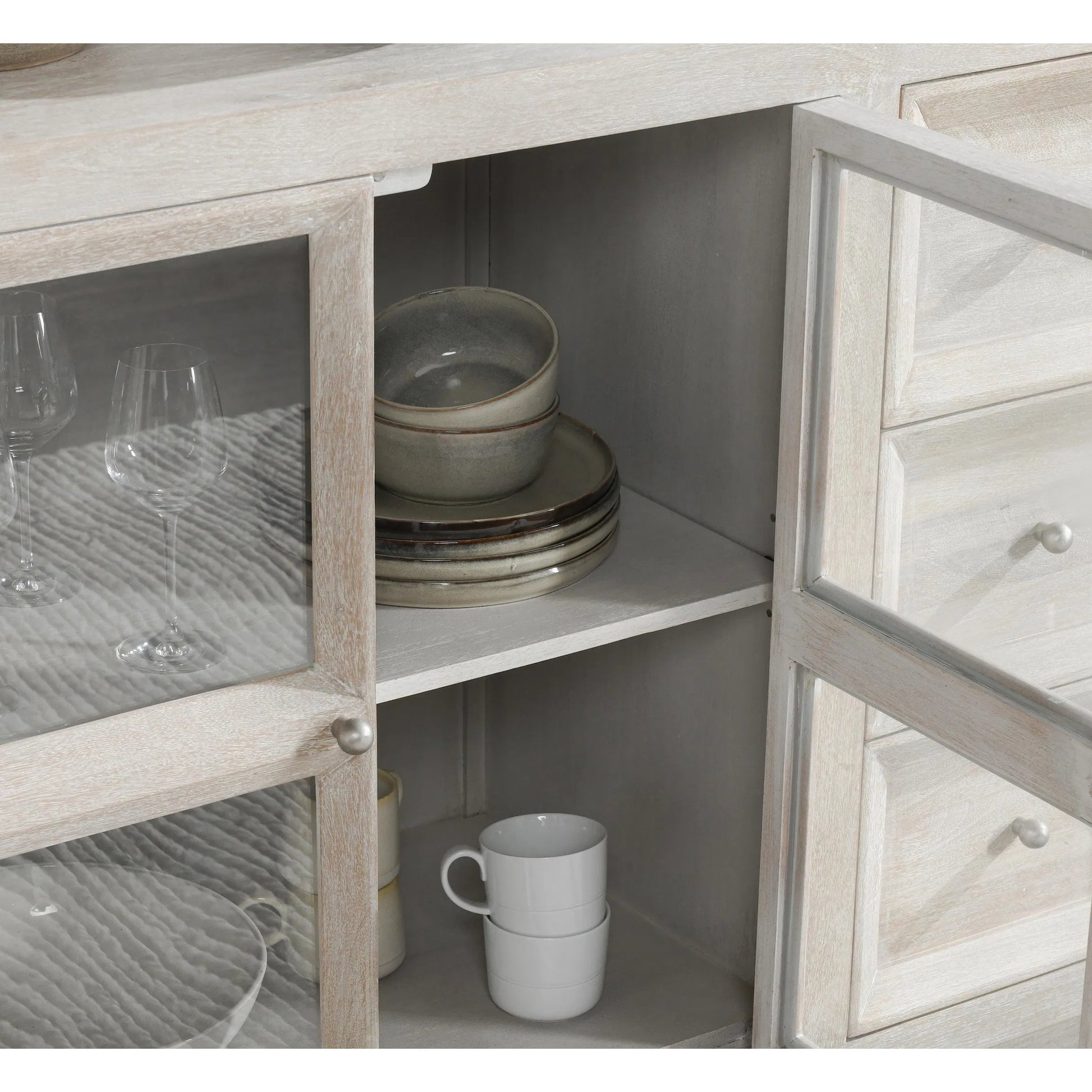 Isha Mango Wood Cabinet by Classic Home in whitewash. Made from mango wood, tempered glass in a transitional style.