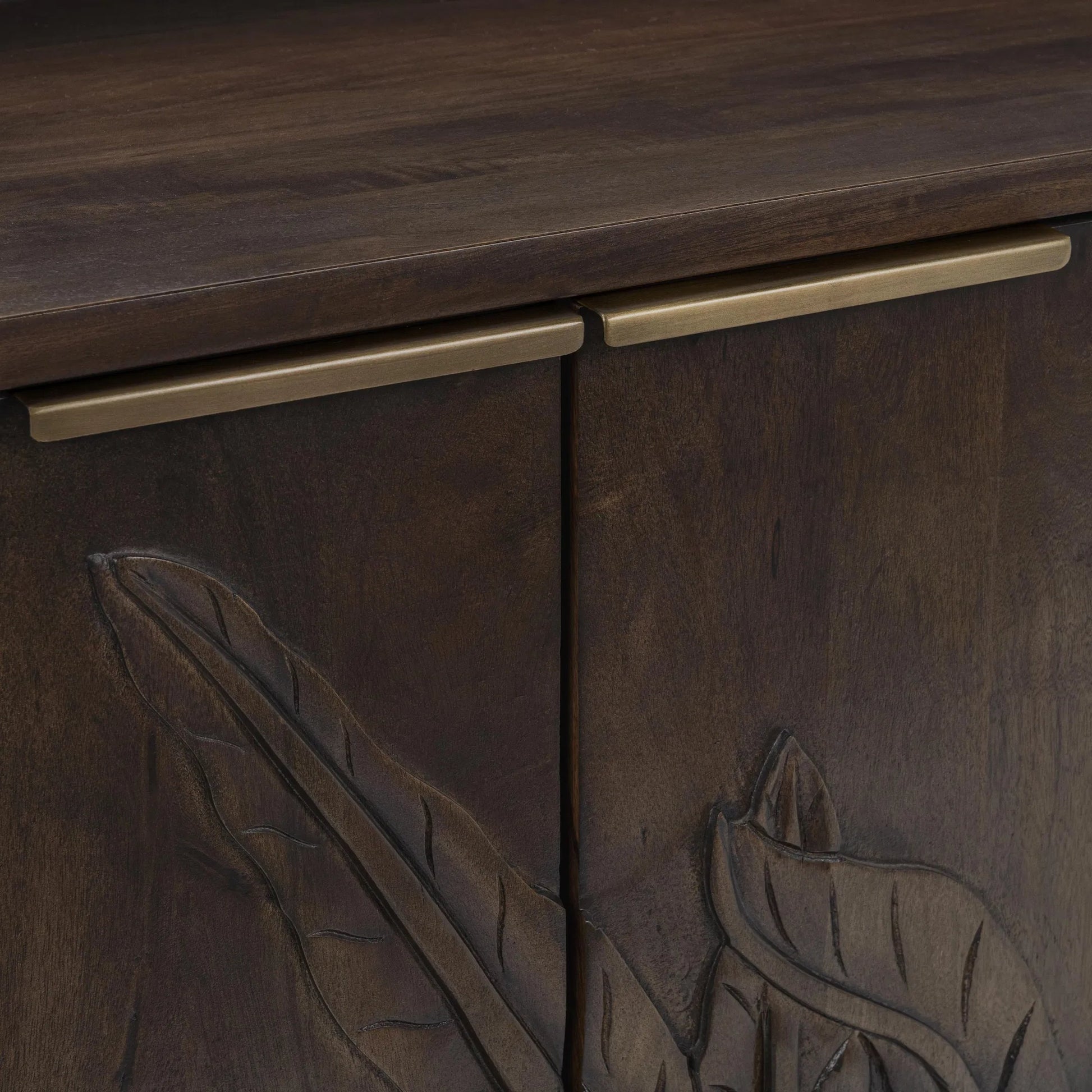 Ledro Solid Wood Dark Brown Buffet Sideboard by Classic Home in dark brown. Made from mango wood in a traditional style.