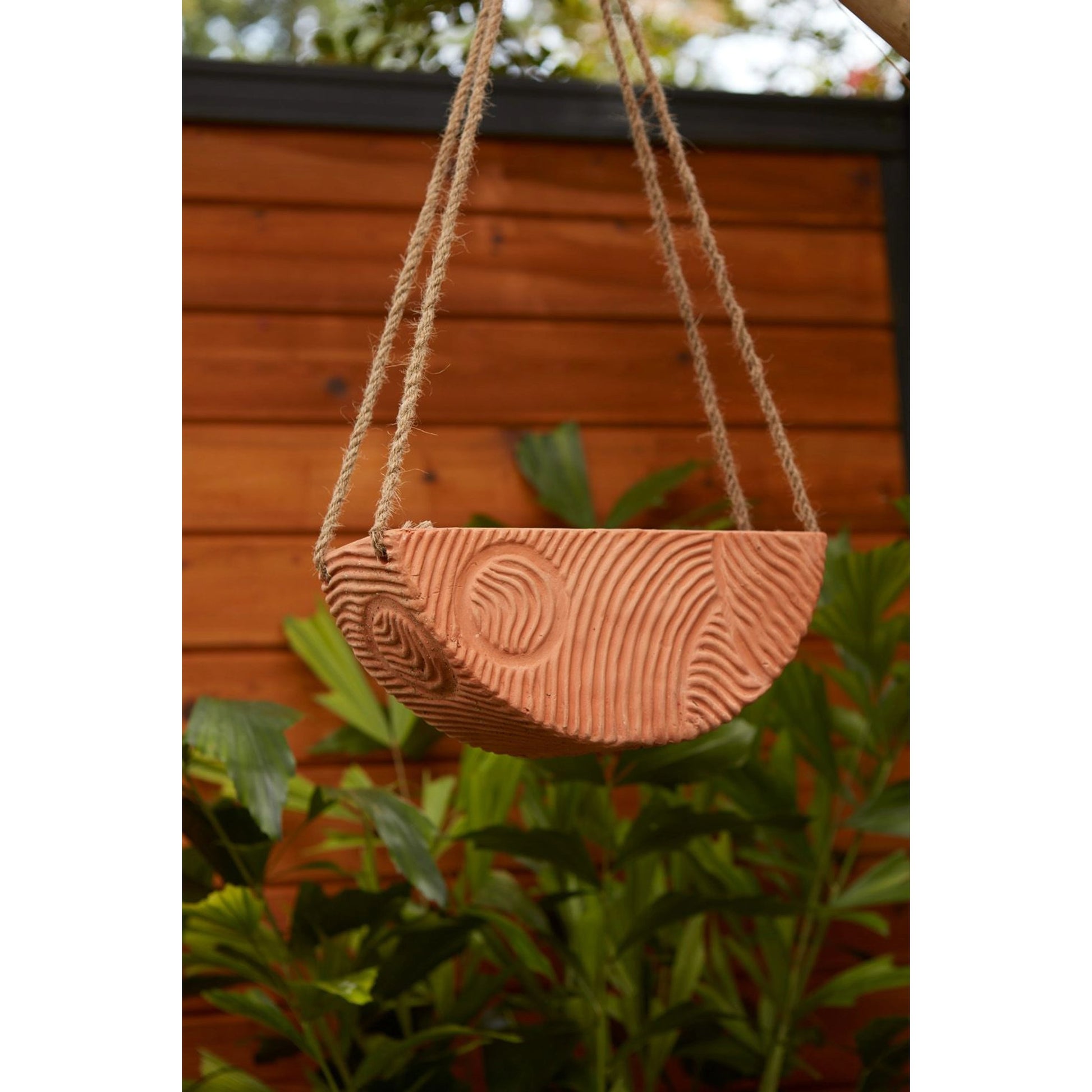 Topography Hanging Planter by Accent Decor. Made from ceramic in a modern style.
