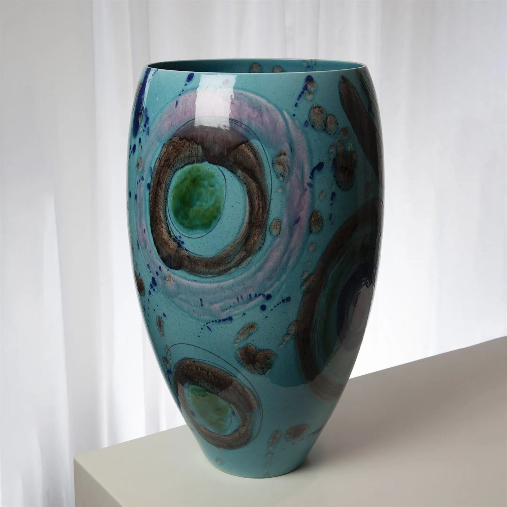 Blue Spots Vase by Global Views. Made from ceramic in a coastal style.