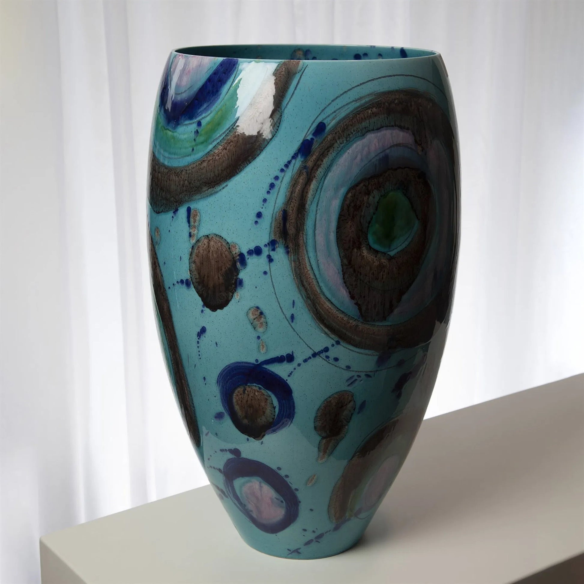 Blue Spots Vase by Global Views. Made from ceramic in a coastal style.