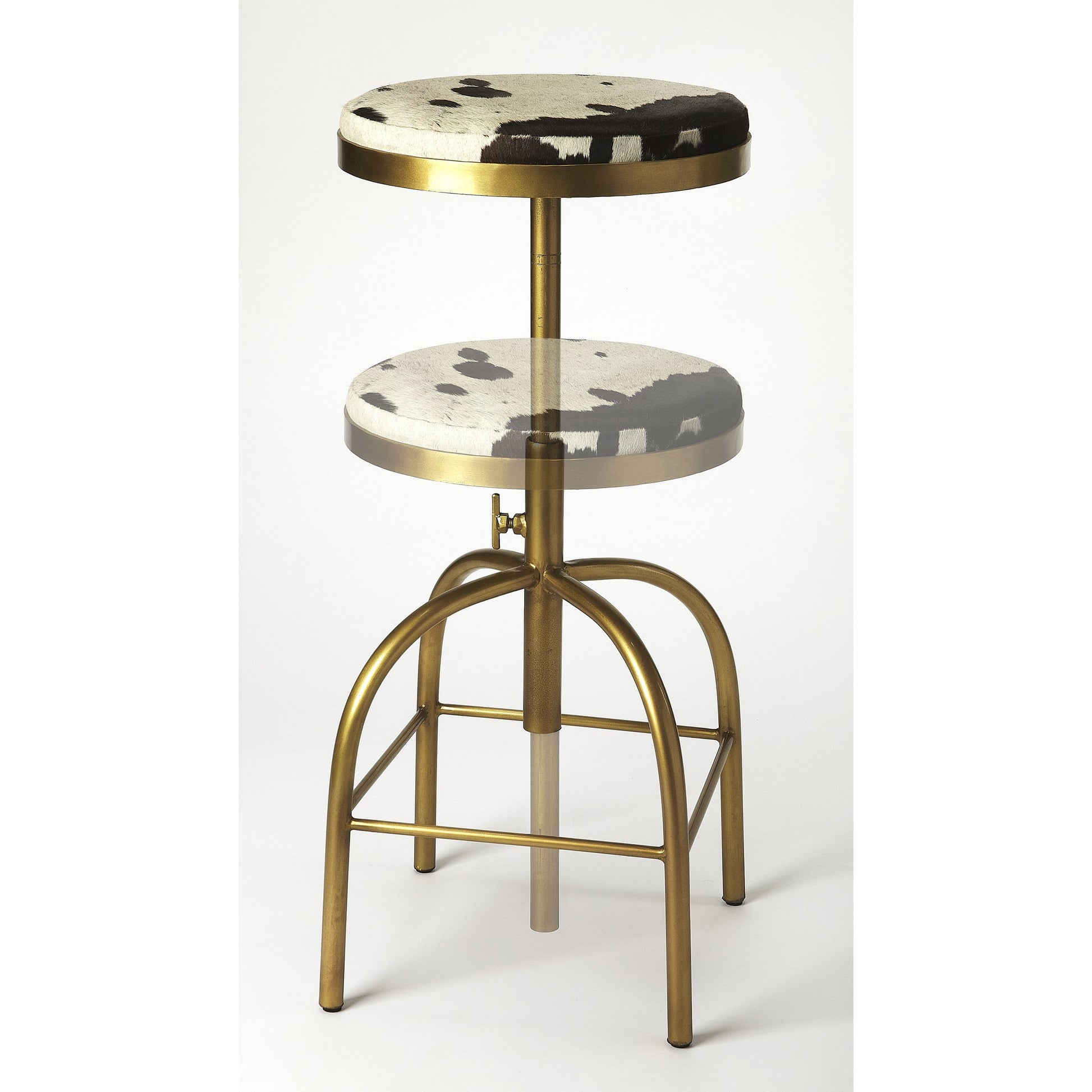 Grogan Hair-On-Hide Barstool by Butler Specialty Company in multi-color and hair-on-hide. Made from iron (gold finish), hair-on-hide, urethane foam (1.75lb. density) in a rustic style.
